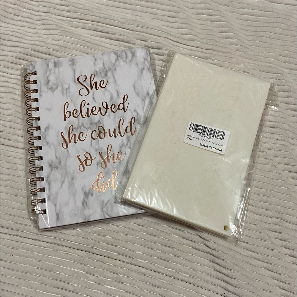 Brand new notebook and pack of letter stencils